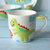 INDRA泰国进口绿恐龙卡通陶瓷餐具碗盘水杯蛋杯釉下彩礼盒装(绿恐龙碗)第5张高清大图