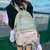 2021新款书包女韩版小学生三四五六年级背包大容量初中ins双肩包(紫色（只带徽章）)第5张高清大图