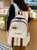 书包女韩版中学生初中生大容量双肩包日系可爱小学生校园百搭背包(红色+胖兔)第3张高清大图