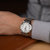 天梭(TISSOT)手表 梦幻系列 男士石英带日历经典商务钢带表T033.410.11.053.01(白色)第5张高清大图