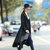 莉妮吉尔2017春装新款高端荷叶边长袖时尚纯色不规则风衣女系带外套(黑色 XXL)第2张高清大图