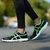 乔丹男鞋跑步鞋2016夏季新款超轻透气运动鞋缓震跑鞋男XM1560262(黑色/闪亮绿 42.5)第4张高清大图