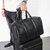 新款旅行包男手工编织大容量旅行袋单肩出差手提包(黑色)第3张高清大图