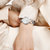 天梭（TISSOT）手表 弗拉明戈系列1853贝母石英表 瑞士时尚圆形女士钢带手表(T094.210.11.116.00)第6张高清大图