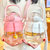 水杯女大容量带吸管便携夏天季塑料大肚杯子高颜值网红运动水壶瓶(粉色1100ml（杯刷+吸管刷+背带+随机贴画+弹盖）)第2张高清大图