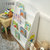 一米色彩 巧虎卡通儿童书架书柜简易层架杂志绘本架学生幼儿园展示落地报刊架(粉红色 80*60*30cm)第3张高清大图