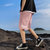 短裤男士夏季新款外穿休闲薄款五分沙滩裤2021年潮流字母宽松中裤(粉红色 M)第4张高清大图