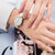 天梭(TISSOT)瑞士手表新款 弗拉明戈系列石英表女表 珍珠贝母表盘优雅时尚腕表(T094.210.26.111.01)第4张高清大图