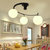 迪开尔创意个性灯具螺旋状咖啡厅餐饮酒吧台黑色铁艺客厅卧室灯(5个灯头)第4张高清大图