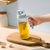 苏泊尔油壶玻璃油壶厨房家用油罐酱油醋香油调料装油瓶自动开合(KG60AL11-600ML)第5张高清大图