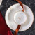 4人餐具8/12/14件套 天鹅陶瓷碗餐具碗套装家用碗米饭碗带菜盘勺子(天鹅金边 4人餐具12件套（圆碗）)第3张高清大图