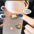 磨砂塑料水杯ins学生韩版可爱高颜值男女便携手提家用杯子大容量(磨砂-UFO飞船杯子+杯刷)第5张高清大图